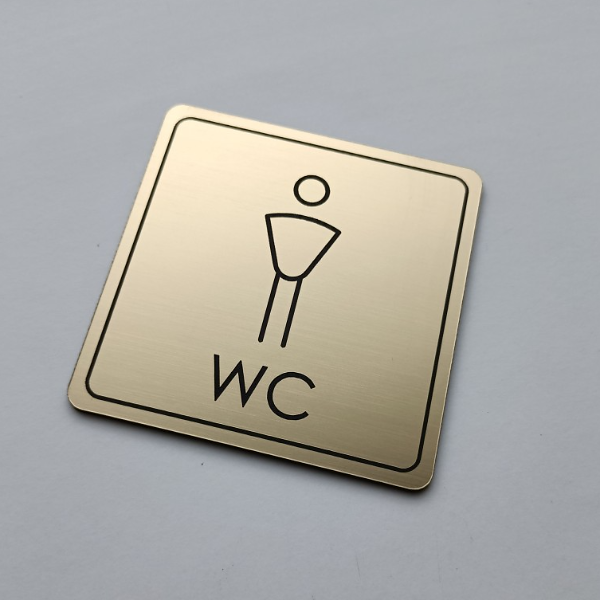 zlatý piktogram WC páni