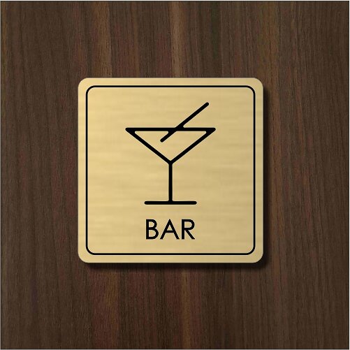 zlatý piktogram bar s koktailovým pohárom
